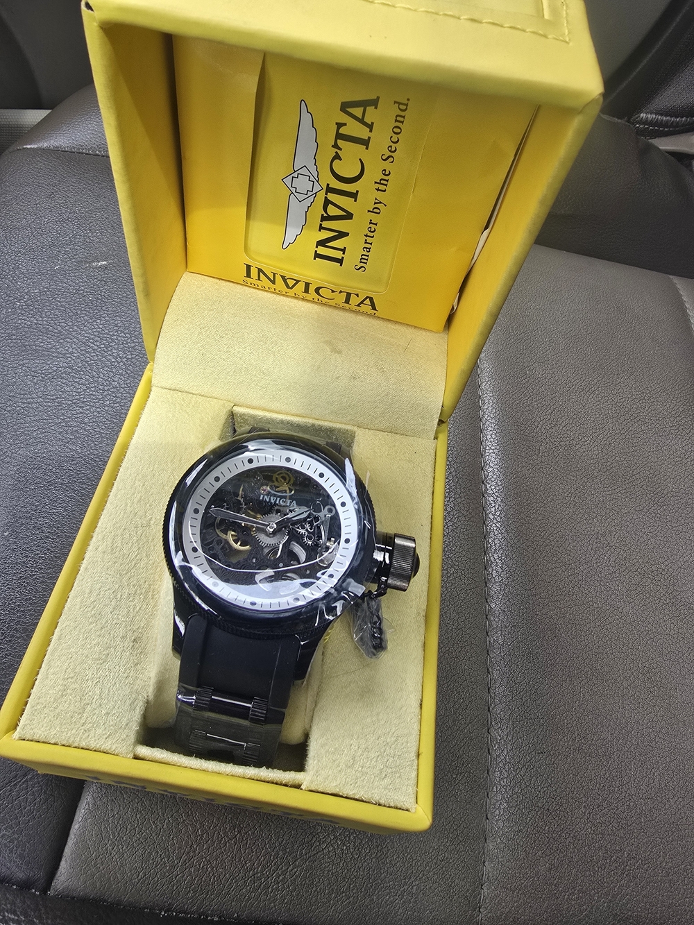 Invicta Black and Silver Skeleton Automatic Watch in Yellow Box